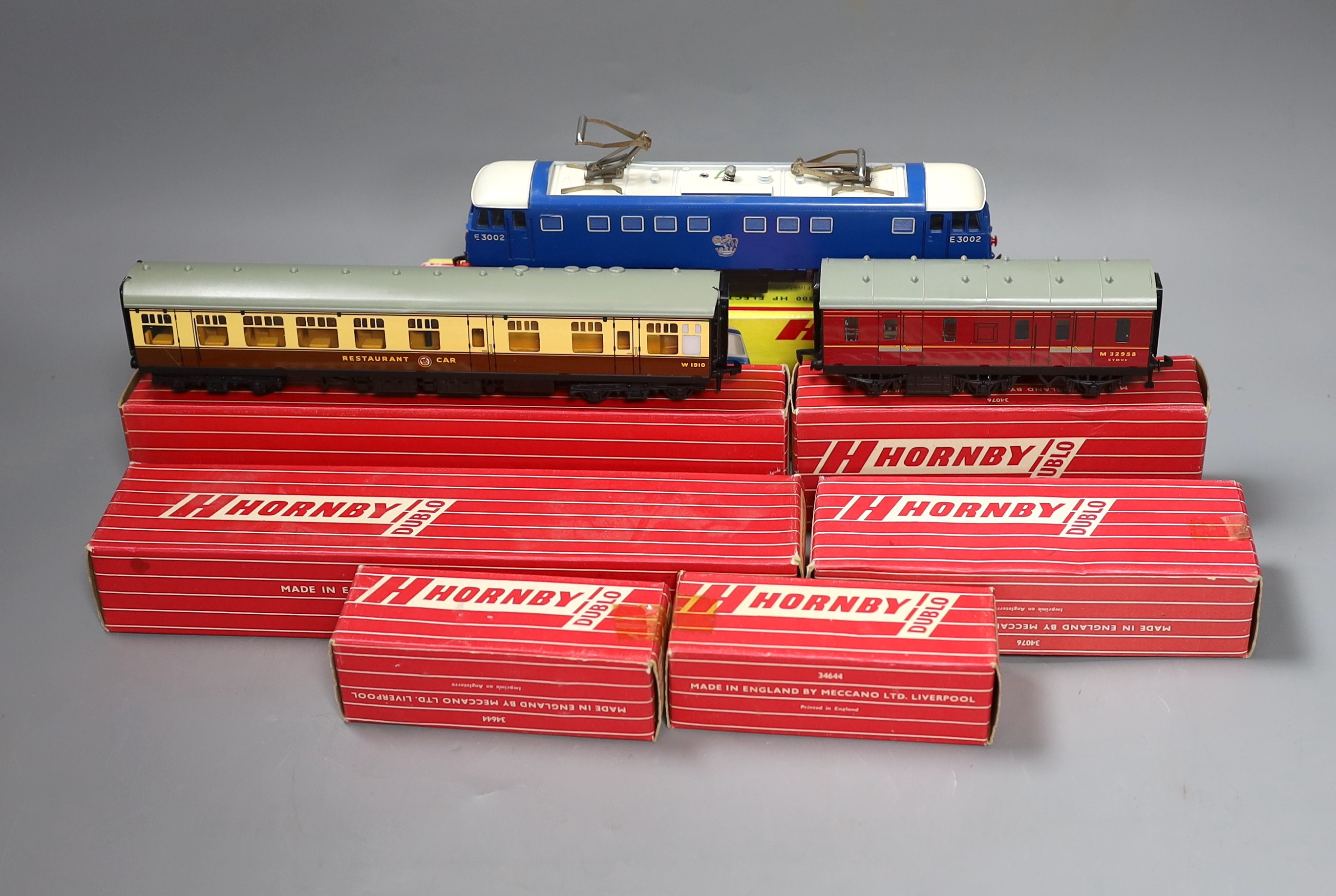 Rare boxed Hornby Dublo - 2245 3300 HP electric locomotive, 4070 and 4071 Restaurant Car, 4076 six wheeled passenger brake van and three empty Hornby boxes